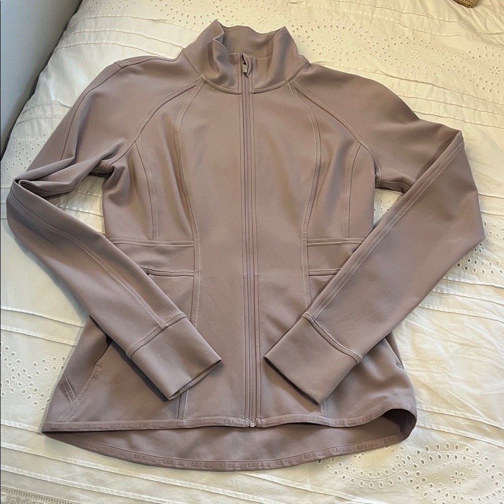 Lululemon In Profile Jacket Size 8 light pink/purple color in great condition!